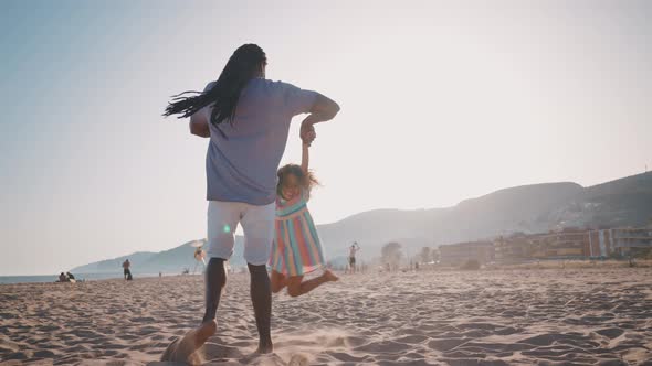 Happy family spending the day at the beach.