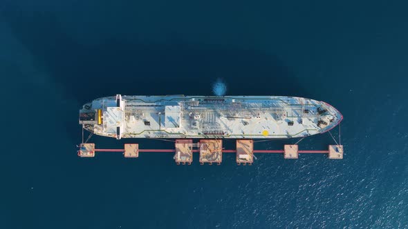 A gas tanker is anchored at sea aerial view 4 K