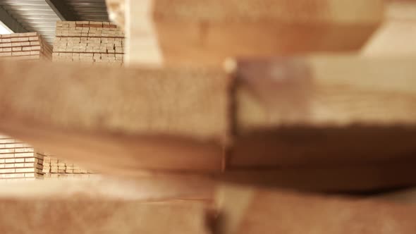 Wooden Boards Stacked in Warehouse After the Process of Woodworking