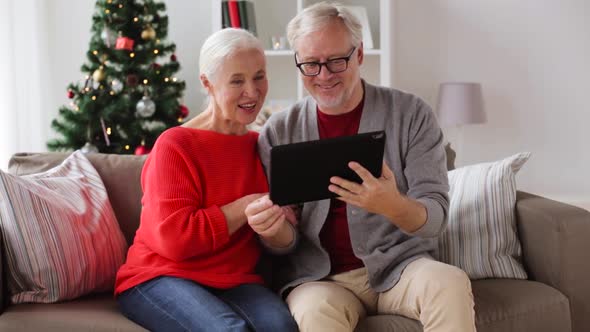 Senior Couple Having Video Call on Christmas 