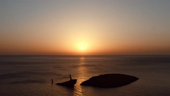 Calm ocean, small ripple motion at sunset.