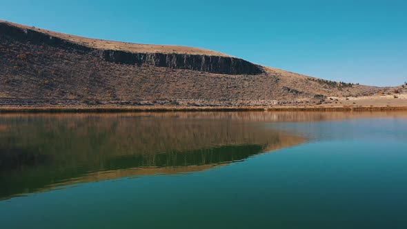 Flying Over the Lake in the Middle of the Sandy Hills