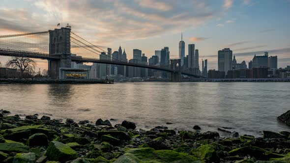 Day to Night Timelapse Sunset Over East River Lower Manhattan Skyline View From Brooklyn Bridge Park