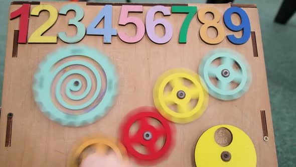 Busy Board for Children Wooden Board with Numbers Gears are Spinning