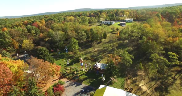 Orbiting camera showing aerial views of an eccentric’s collection of giant American roadside attract