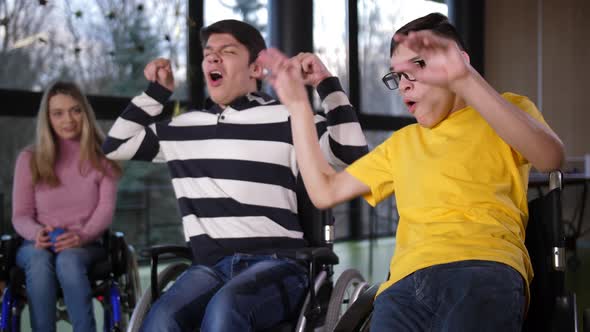 Happy Disabled Boys Rejoicing Winning Bocce Game