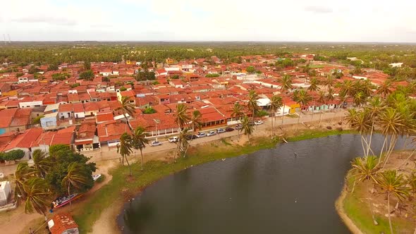 Aerial view of rooftops and small streets of Rio do Fogo town, Brazil.