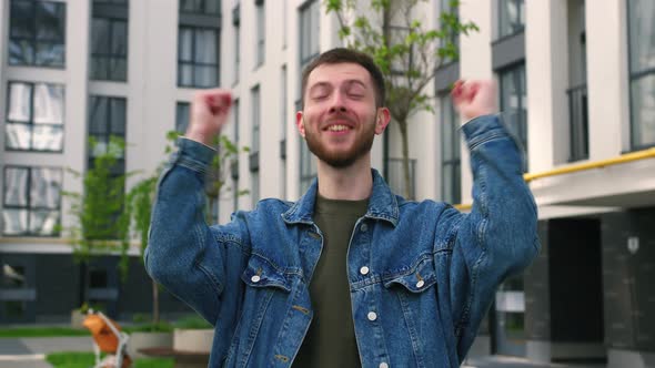 Cheering Young Man Celebrating His Success Happy Surprised Amazed