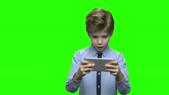 Little Boy Child Kid Playing Games on Smartphone