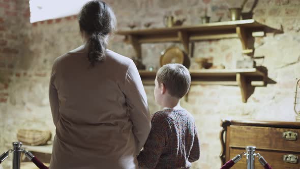 Mother and Son Visit Historical Museum