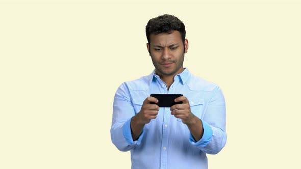 Businessman Playing Mobile Phone Game