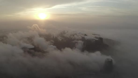 Aerial View. Emission To Atmosphere From Industrial Pipes. Smokestack Pipes Shooted with Drone.