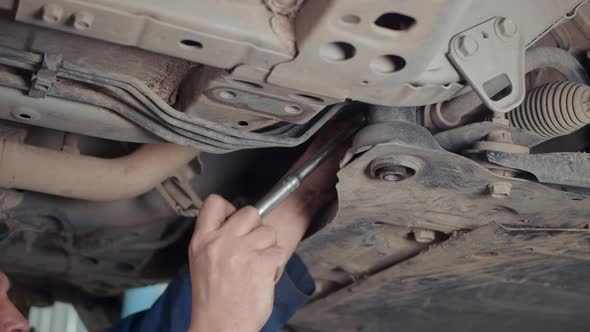 Car Brake Disc And Brake Pads Repair in the Car Repair Shop