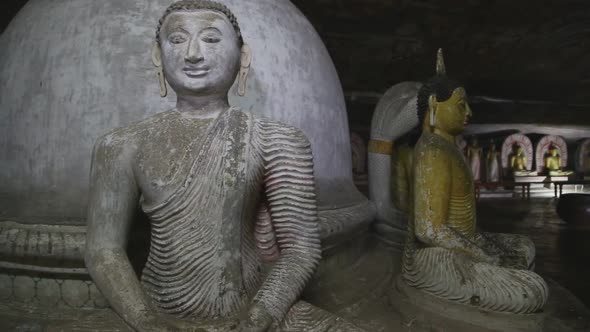 DAMBULLA, SRI LANKA - FEBRUARY 2014: Sitting Buddhas at the Golden Temple of Dambulla. The Golden Te