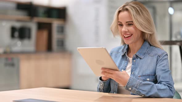 Winning, Young Casual Woman Celebrating Success on Tablet 