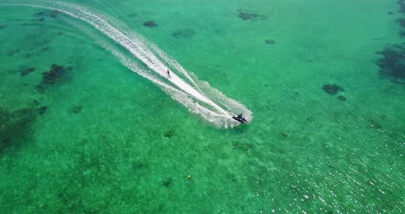 Luxury overhead abstract view of a paradise sunny white sand beach and aqua blue ocean background in