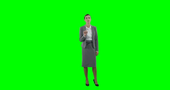 Businesswoman touching futuristic digital screen