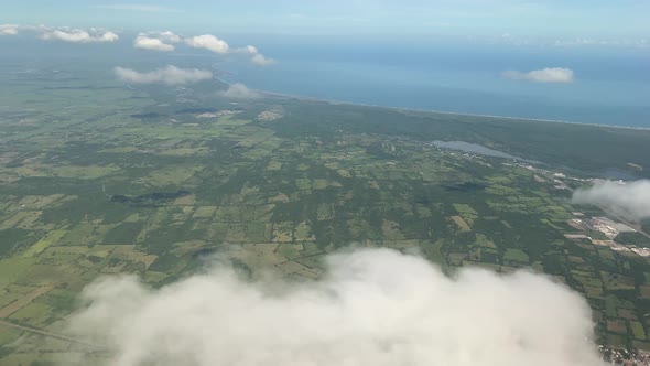 Veracruz Puerto seen from an aircraft, flying above the clouds, visit mexico travel flight