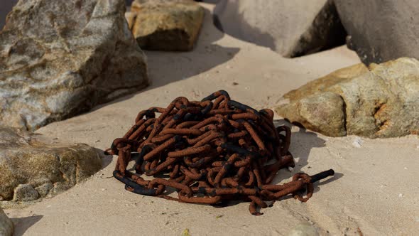 Old Rusted Chain in the Sand