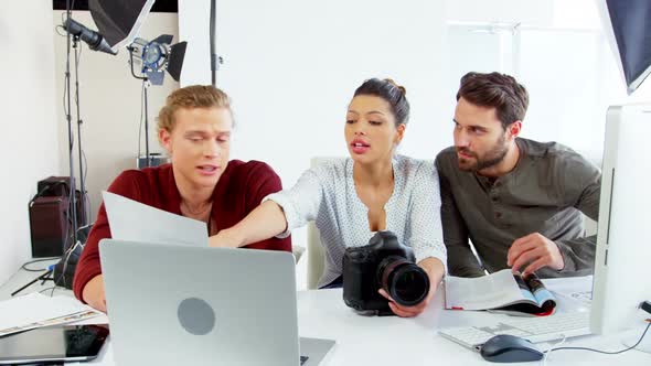 Photographer discussing on photos