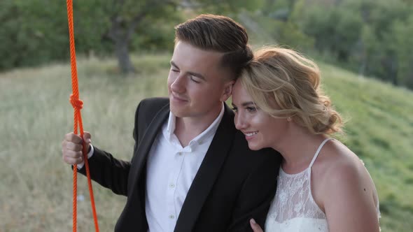 Couple on a swing