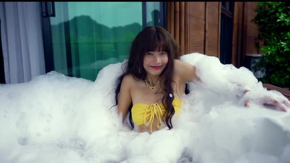 Cute Smiling Asian Girl in Bikini in Hot Tube Thailand