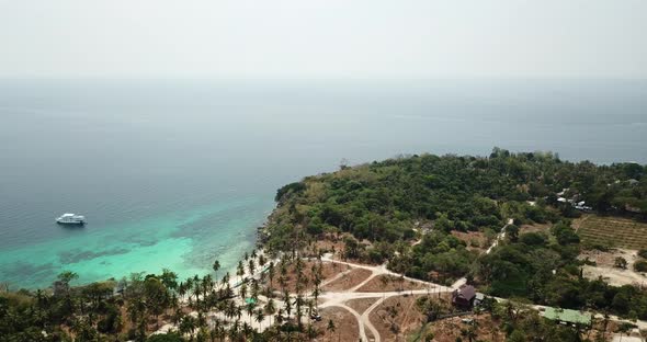 Green Palm Trees and Fields of Racha Island