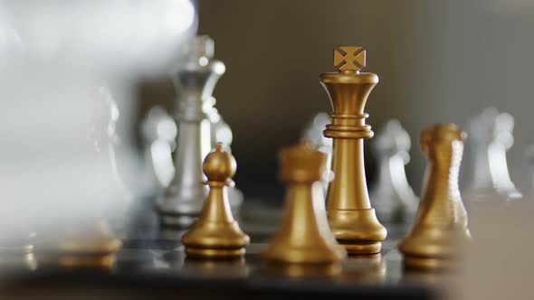 dolly shot of close up chess board game business strategy ideas concept with blur bokeh background
