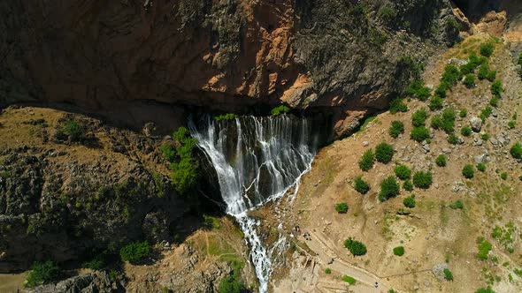 Rocky Waterfall In Mountain River