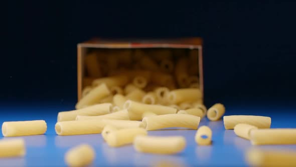 Falling A Box With A Big Macaroni (Tortiglioni)