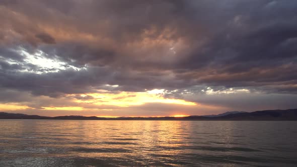 Colorful sunset reflecting in Utah Lake
