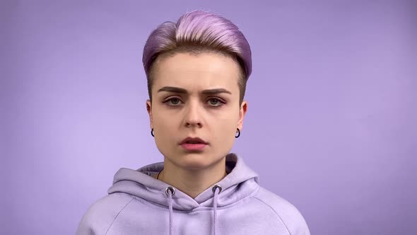 Young Woman Turning Head Left Right Gesturing Finger Violet Background