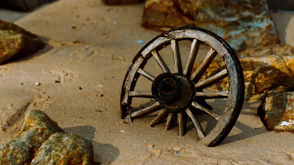 Old Wooden Cart Wheel at Sand Beach