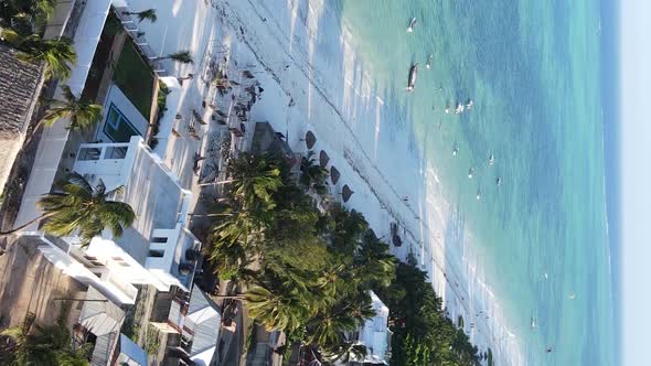 Vertical Video of the Ocean Near the Coast of Zanzibar Tanzania Aerial View