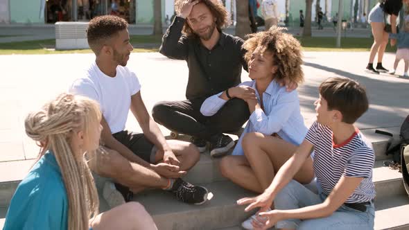 Stylish Multiethnic Friends Chilling on Street