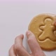 Men's Hands Break Sugar Cookies Candy in the Shape of a Man - VideoHive Item for Sale