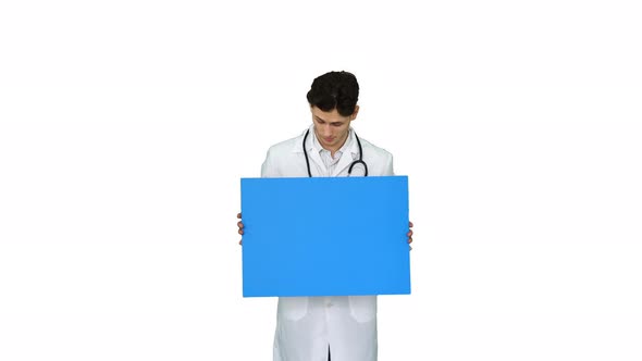 Happy Smiling Male Doctor Showing Blank Signboard and Dancing on White Background.