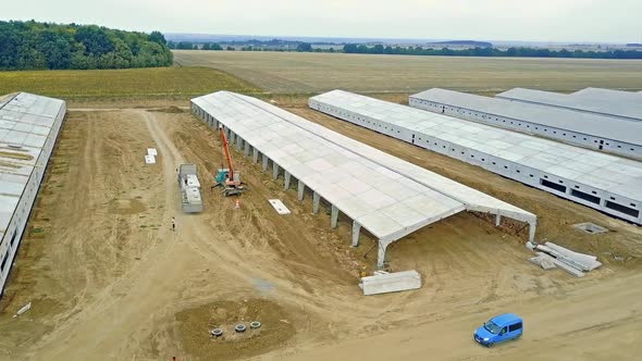 Farm construction in progress. New future building farm for livestock