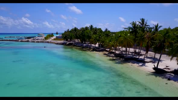 Aerial above panorama of beautiful coast beach wildlife by blue sea with white sandy background of a