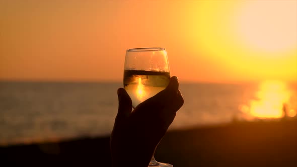 A Glass of Wine at Sunset By the Sea