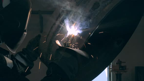 The Welder Works Out the Skill of Welding Pipes on the Simulator