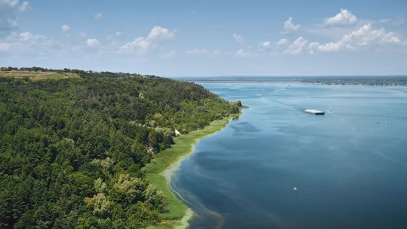 Aerial Flight Over River and Green Hills Coast alt