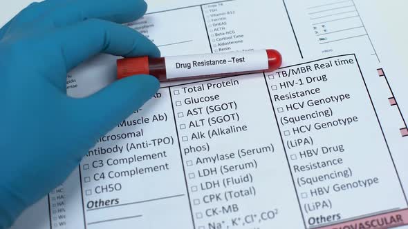 Drug Resistance, Doctor Checking Name in Lab Blank, Showing Blood Sample in Tube