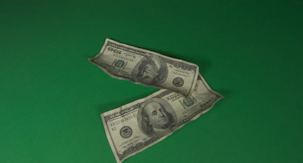 Dollars. American Money Close-up on a Green Background Hromakey . 100 Dollar Bills. One Hundred