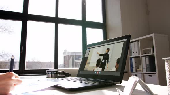 Woman with Laptop Having Video Call at Office