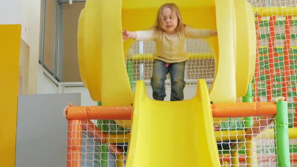 Happy Baby Riding Down Slide Children's Play Center Kindergarten Funny