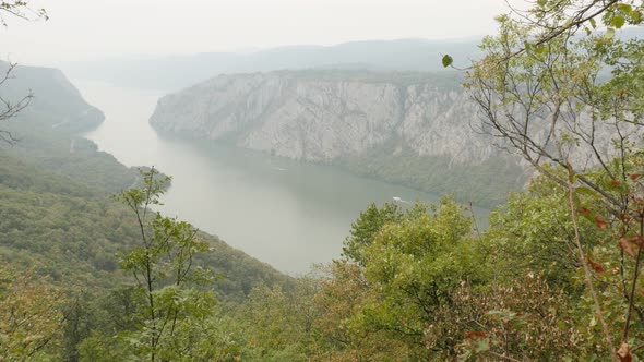 Danube river gorge Mali Kazan by the day 4K 2160p 30fps UltraHD footage - Border between states of S