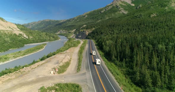 Two White R vs Moving Along the Mountain Road in Alaska