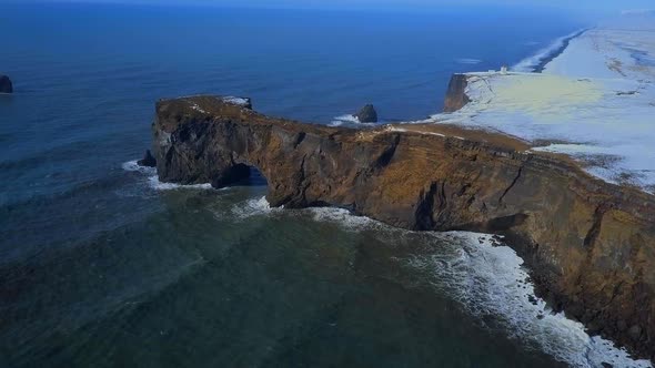 Dyrholaey Arch in Iceland Aerial View