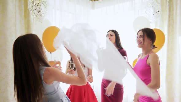 Beautiful Female Friends Dancing and Laughing at Hen Party